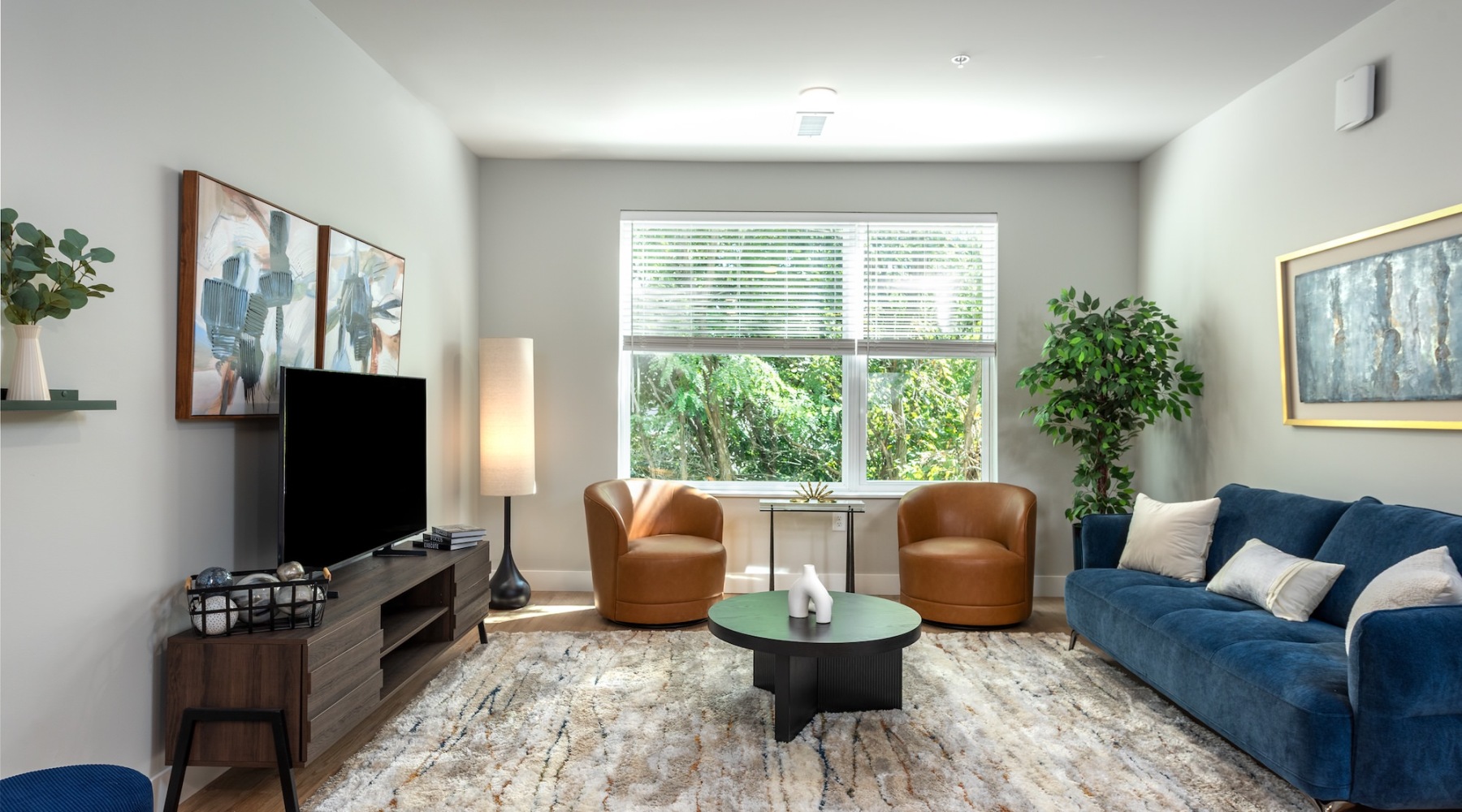 Open space living area with natural lighting