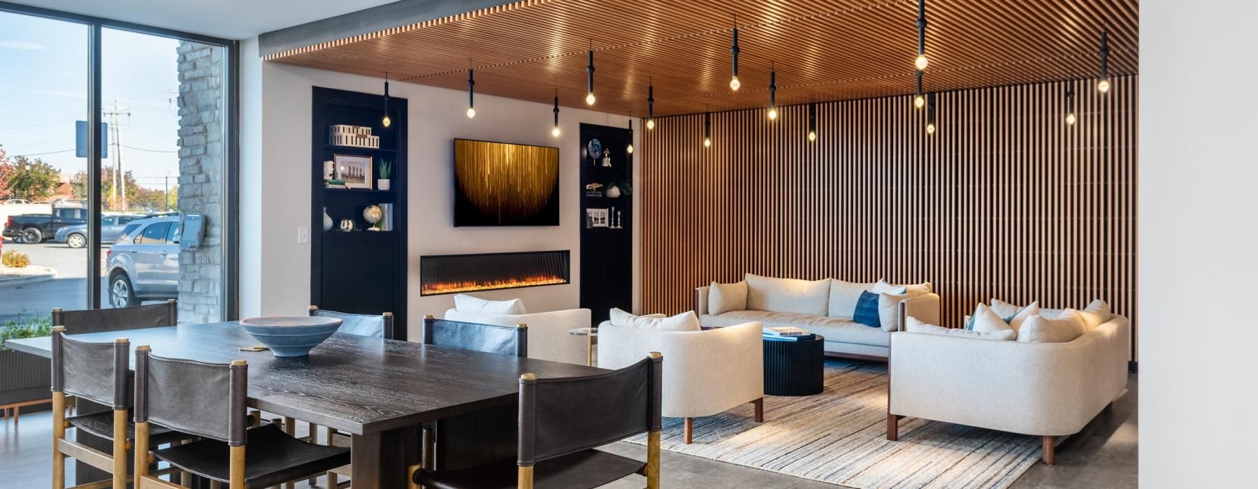a room with a table chairs and a couch