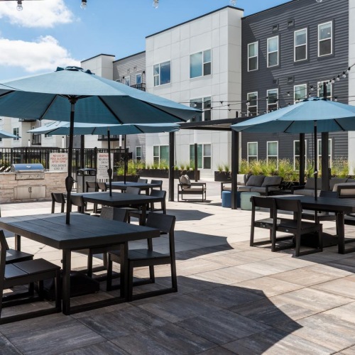 poolside tables with umbrellas